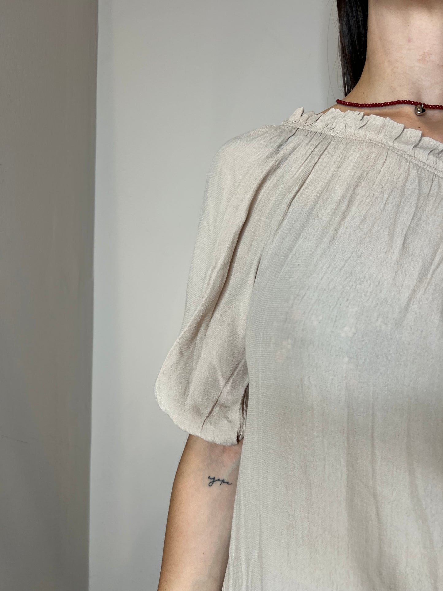 blusa monospalla