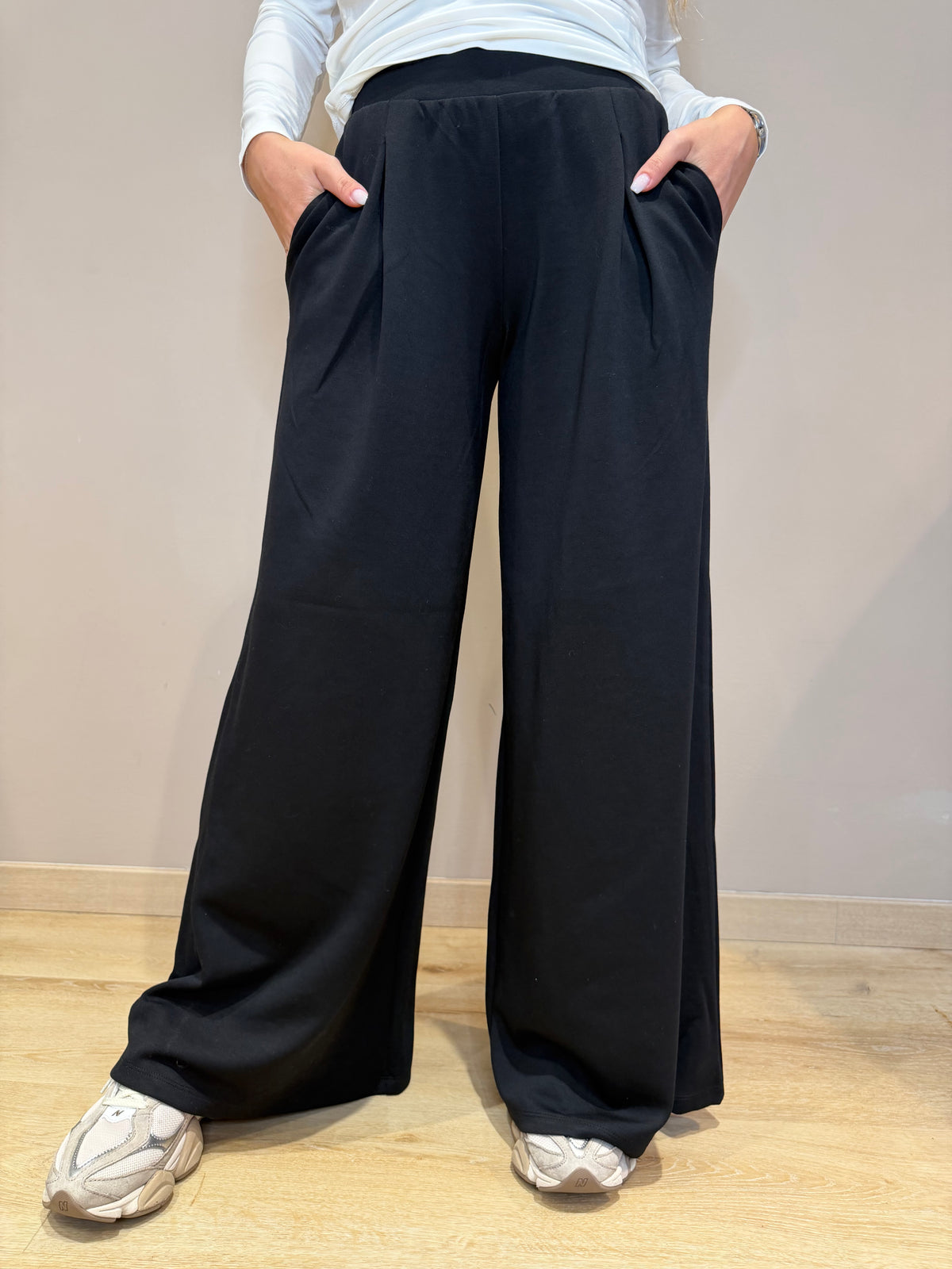 Pantalone fascia a vita con pence