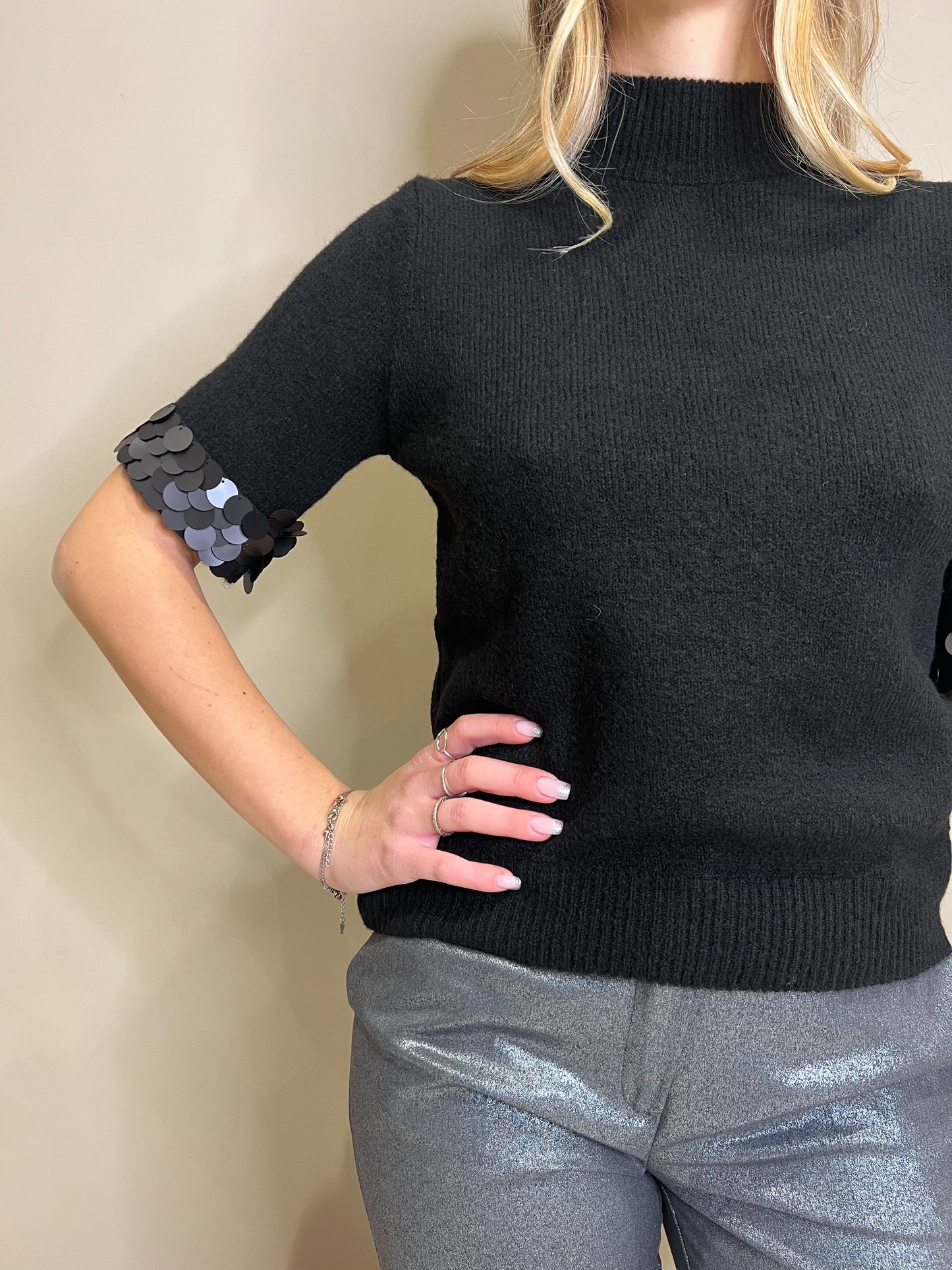 Pullover con polso di paillettes