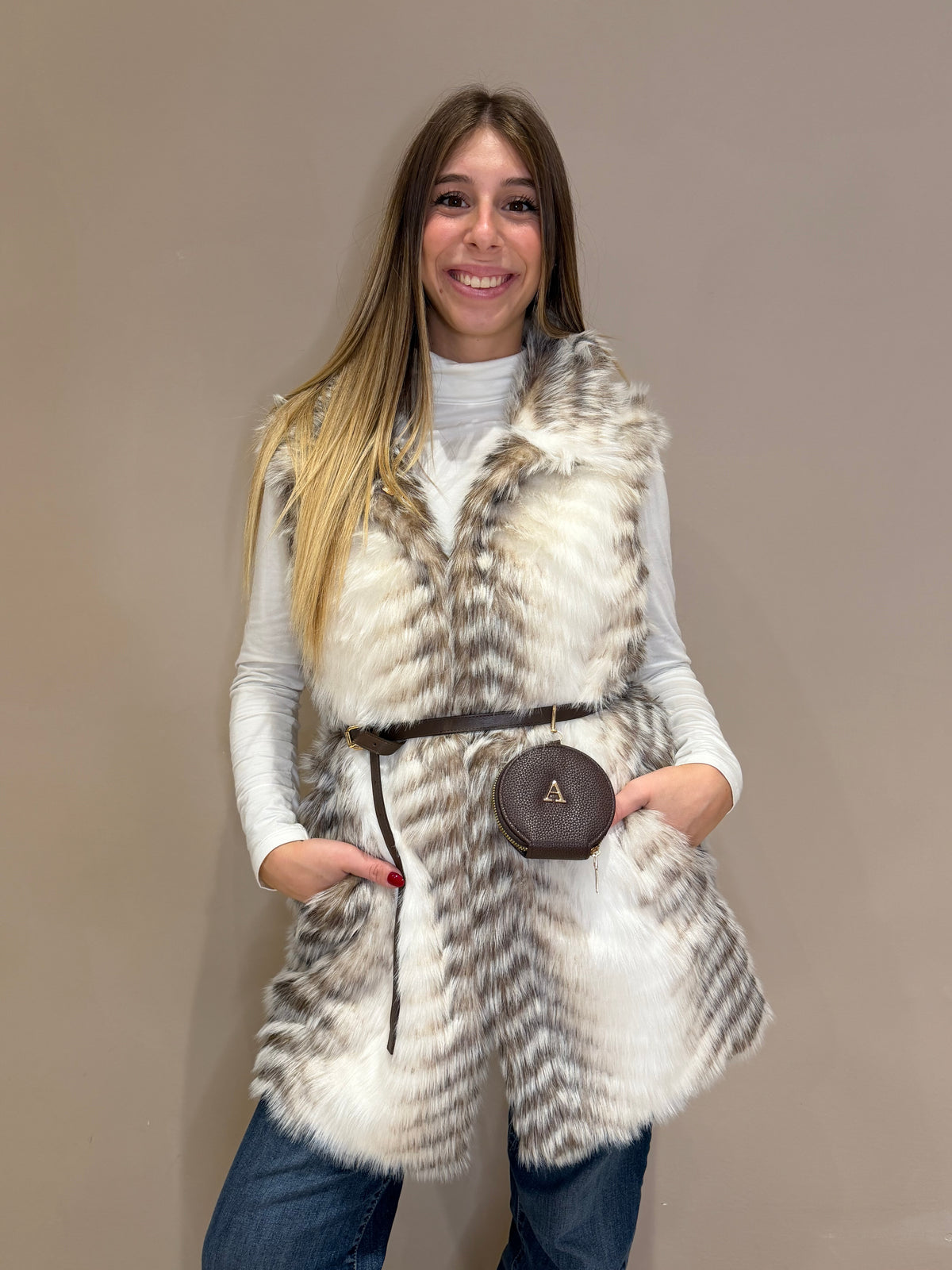 Gilet ecopelliccia con accessorio