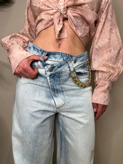 Jeans abbottonatura ad incrocio