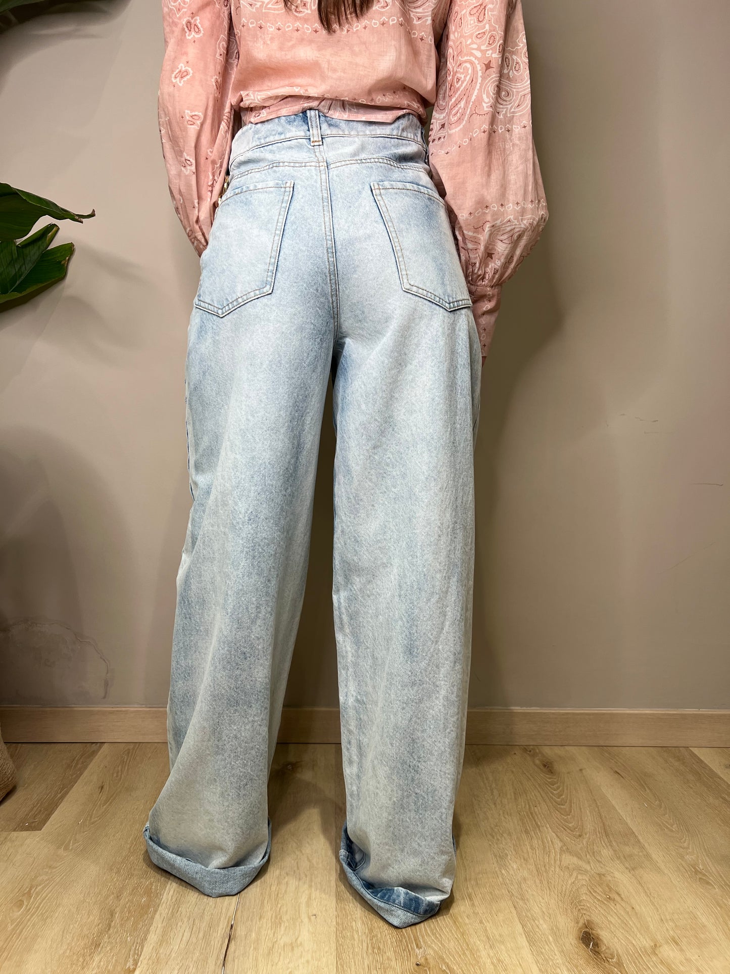 Jeans abbottonatura ad incrocio