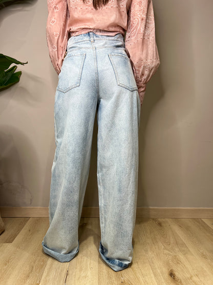 Jeans abbottonatura ad incrocio