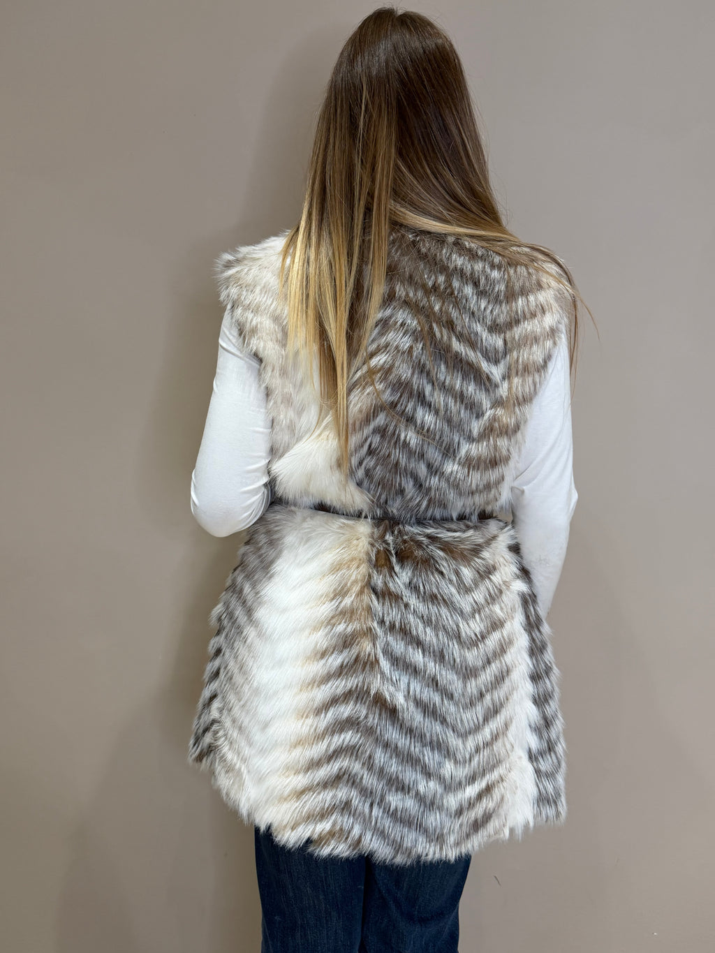 Gilet ecopelliccia con accessorio